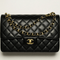 CHANEL LARGE CLASSIC
HANDBAG
Grained Calfskin & Gold-Tone Metal
