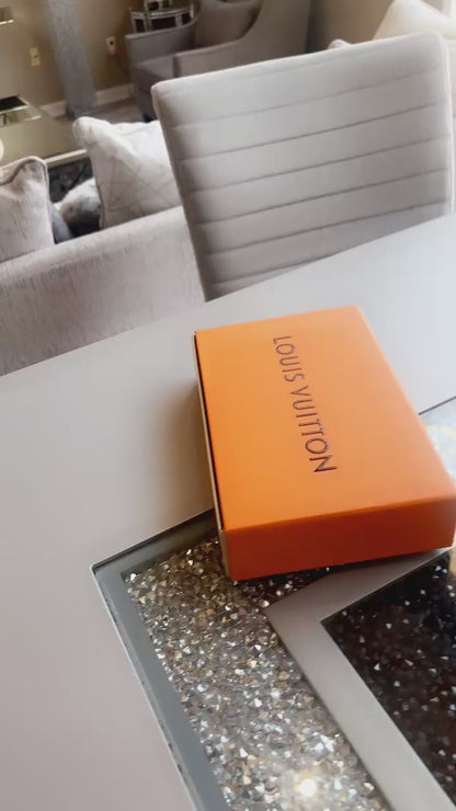Louis Vuitton's classic models, the Sarah wallet